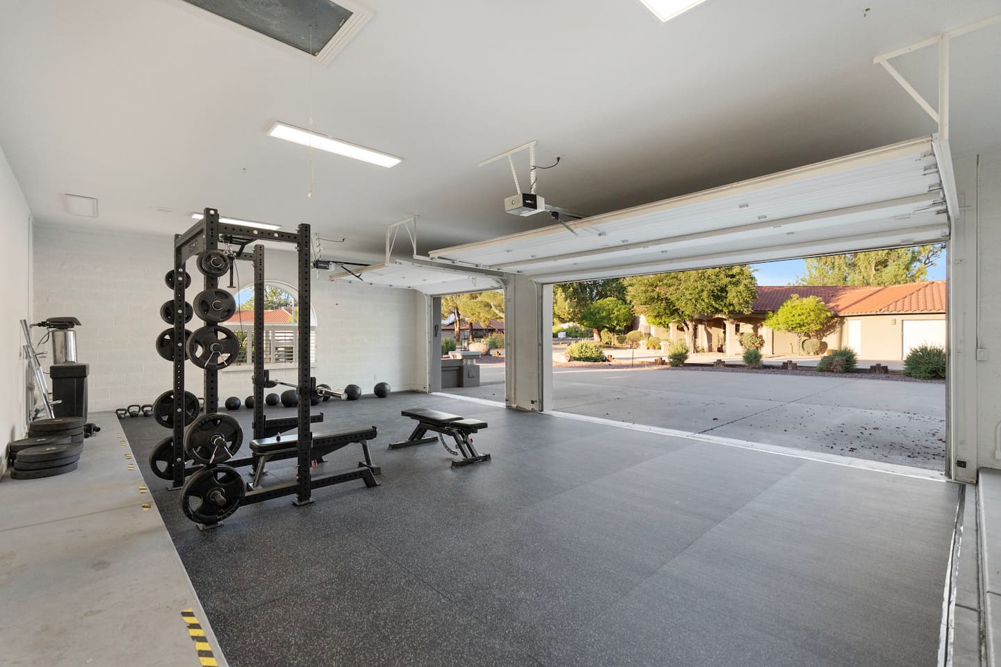 Roll open the doors and let the fresh air in—seamlessly blend indoor and outdoor training with this flexible gym layout.

