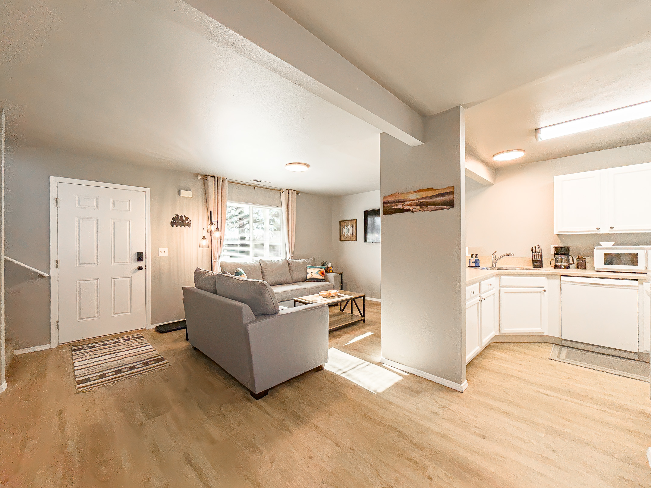 3006 Regan – Open Floor Plan
Open layout connecting the living room, kitchen, and dining area.