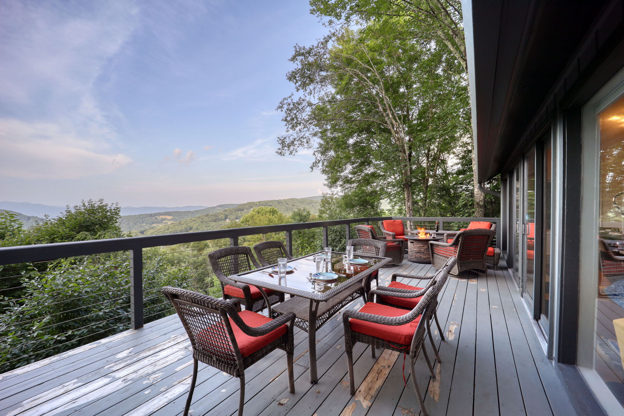 Best mountain views on Beech Mountain!  Enjoy our upper deck and patio featuring a dining table, fire pit, and plenty of seating right off of the main living area.