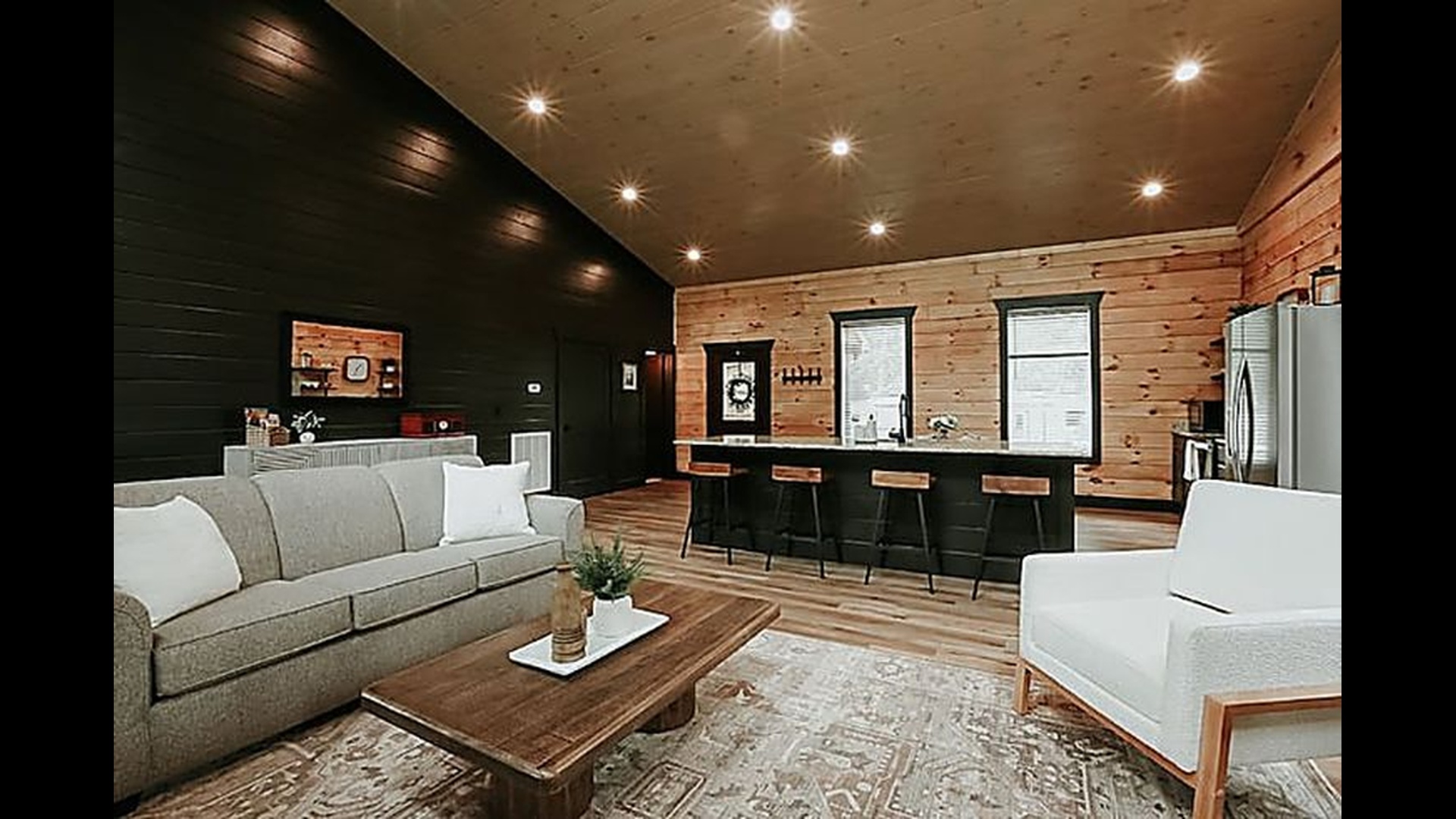 Gather in the bright, open living room where modern touches meet mountain comfort