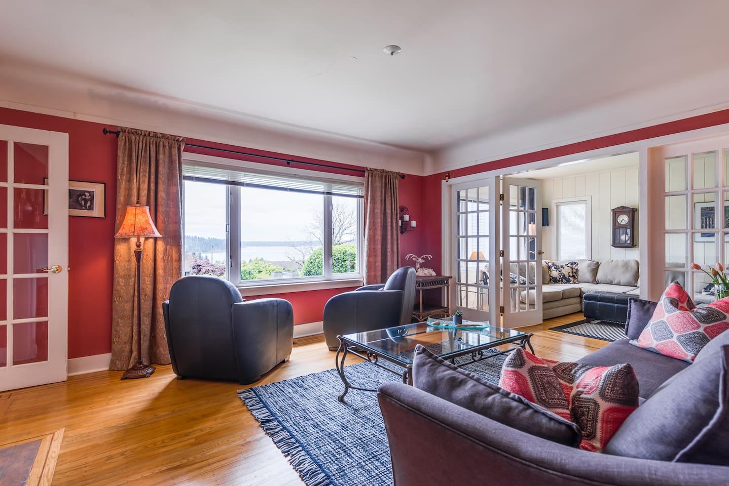 Warm colours throughout the house and comfortable furnishings - meant for living in!    When we have guests we turn these two leather chairs around to face the room - but when it’s just us we have them facing the view.