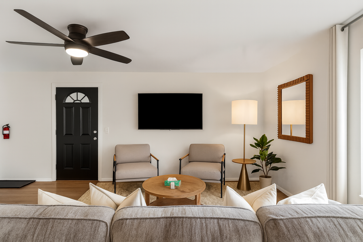 Cozy living space designed with comfort in mind—great for streaming, lounging, or catching up with friends.