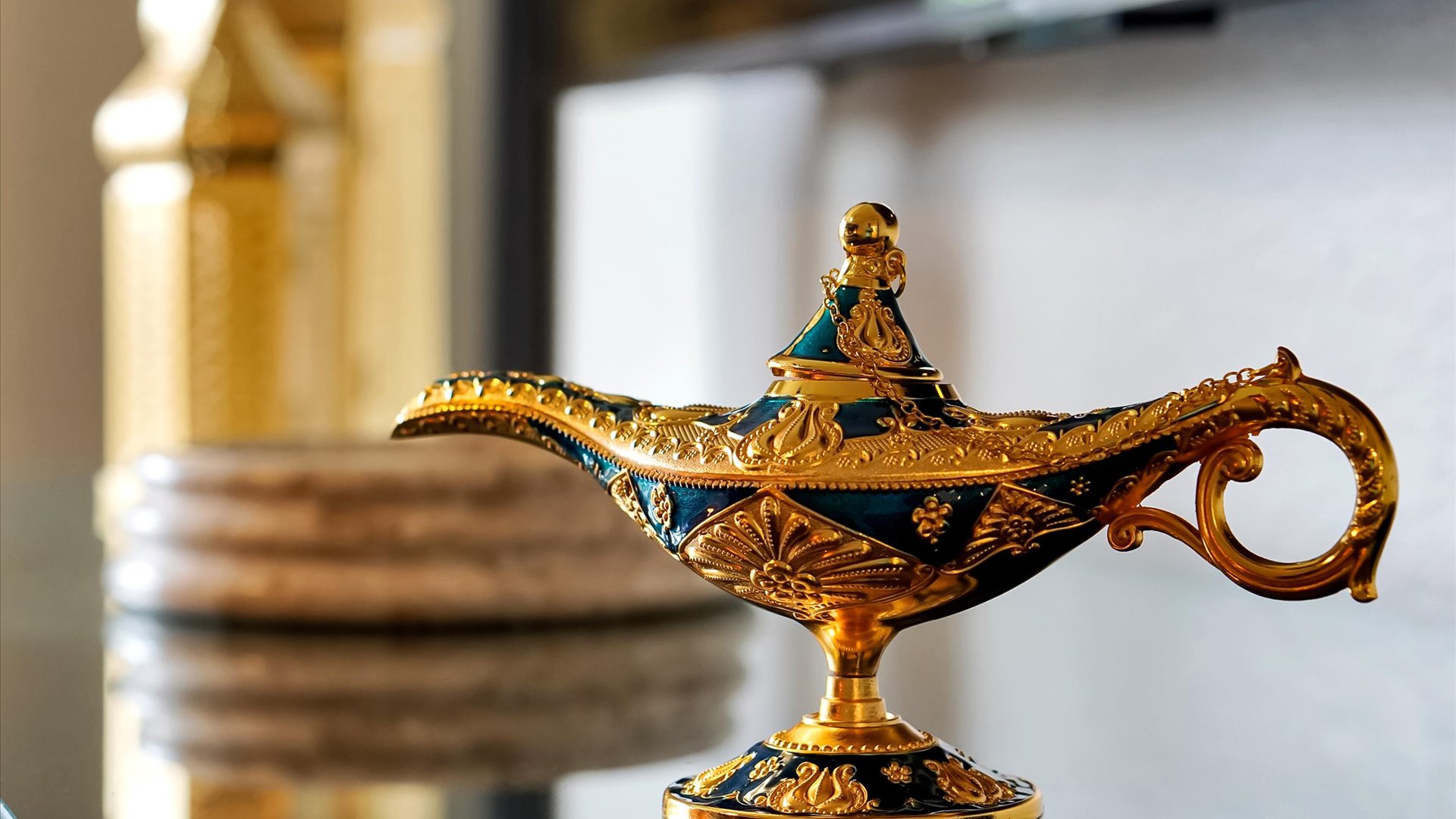 Aladdin King Suite: An ornate magic lamp adds the perfect finishing touch to this richly themed retreat.