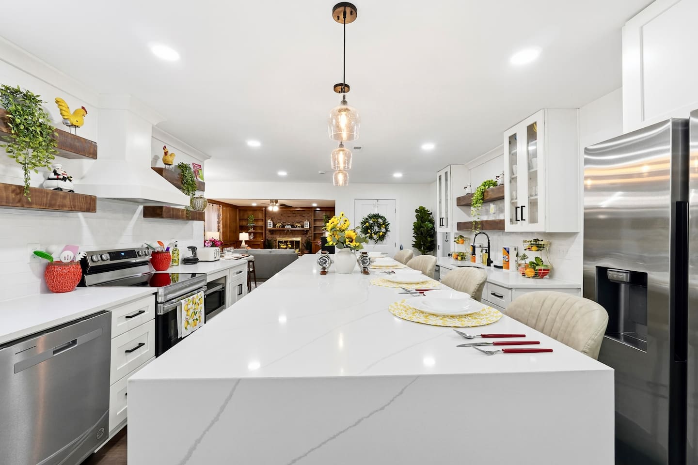 Beautiful white kitchen fully equipped with all the appliances and essentials of a home away from home.