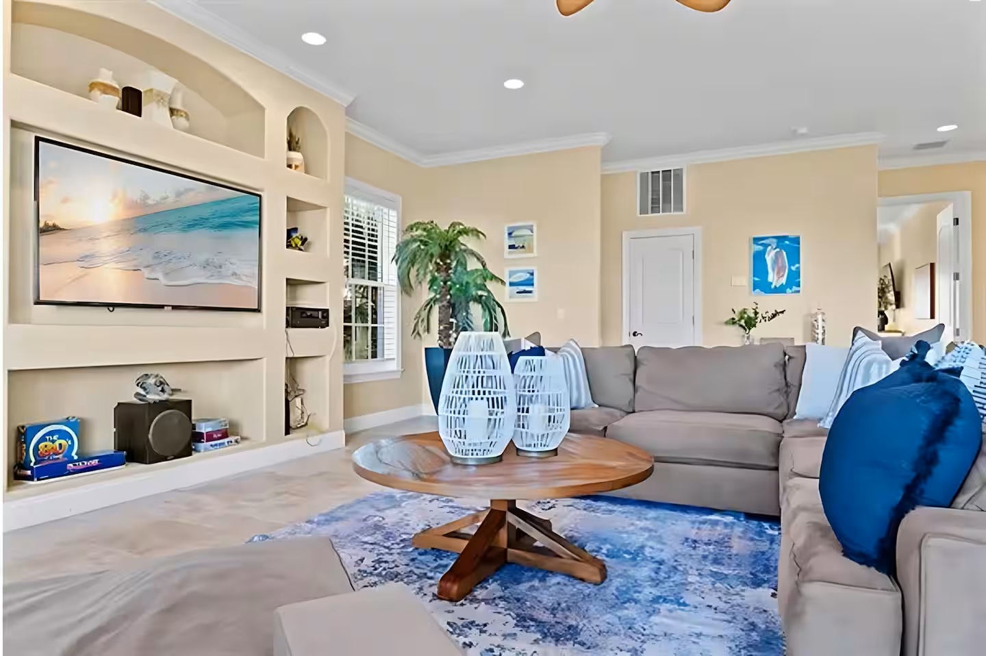 Room to relax, recharge, and reconnect 🛋️
This spacious living area offers plush seating, coastal décor, and plenty of space for movie nights, games, or quiet moments together.

