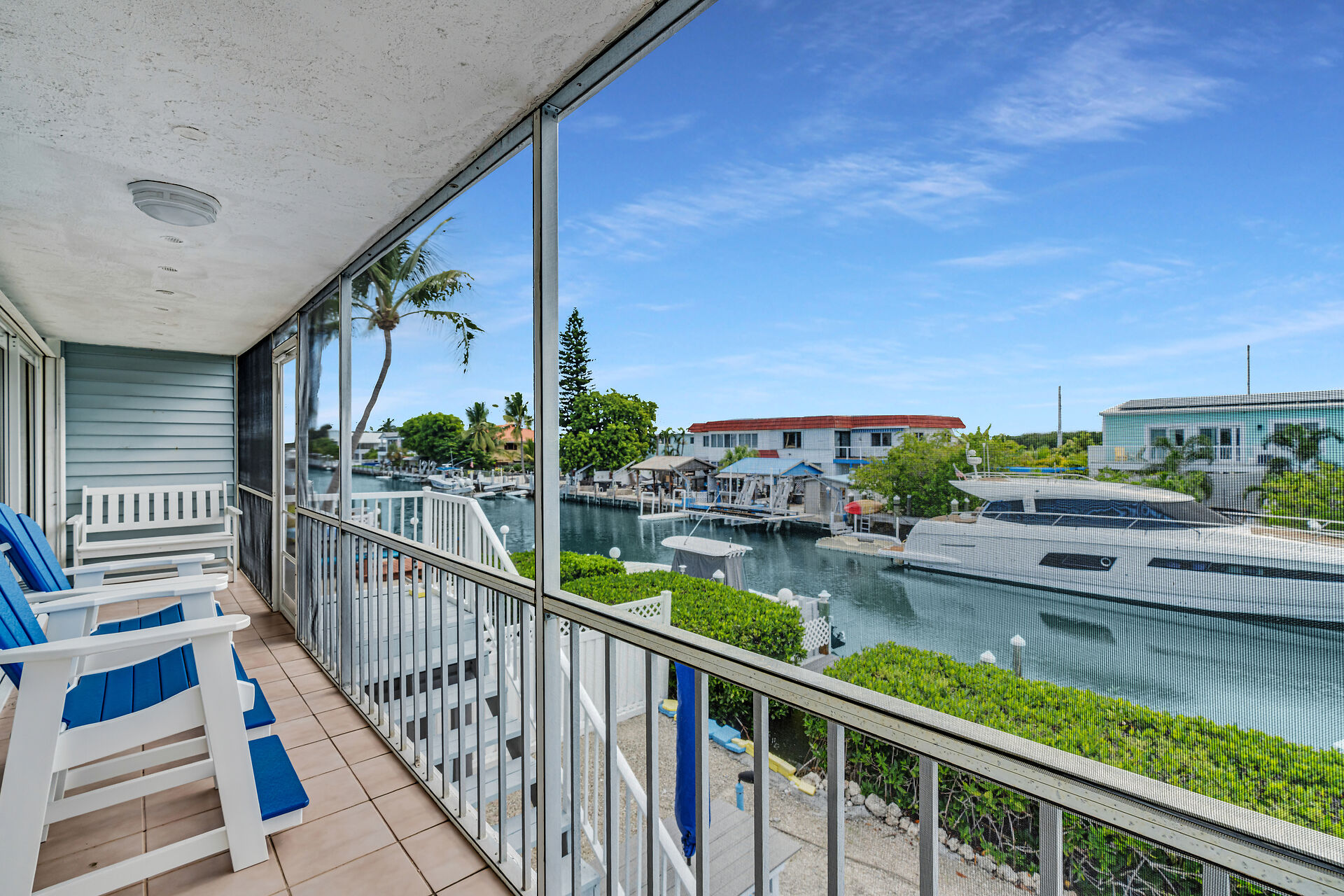 Screened-in patio to watch the dolphins swim by