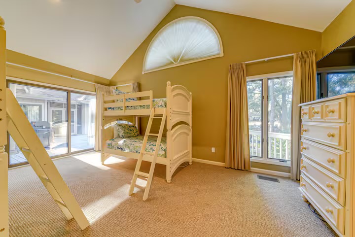 Four twin bunks, in room connected to Primary King Bedroom