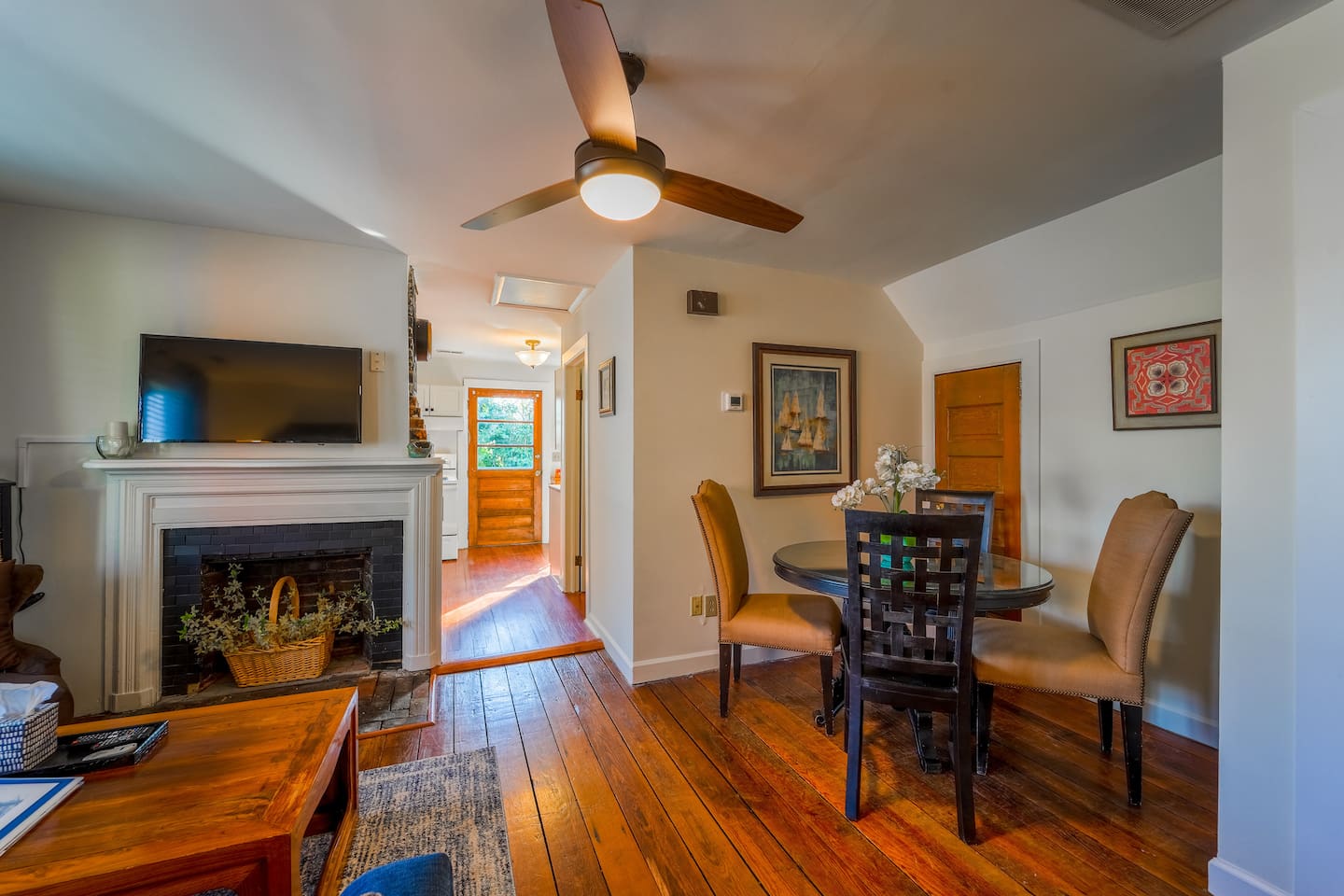 Beautiful, original hardwood floors throughout! Lovely dining area with beautiful artwork. A thermostat you can control, for your comfort and a new Smart T.V. with speed wifi.