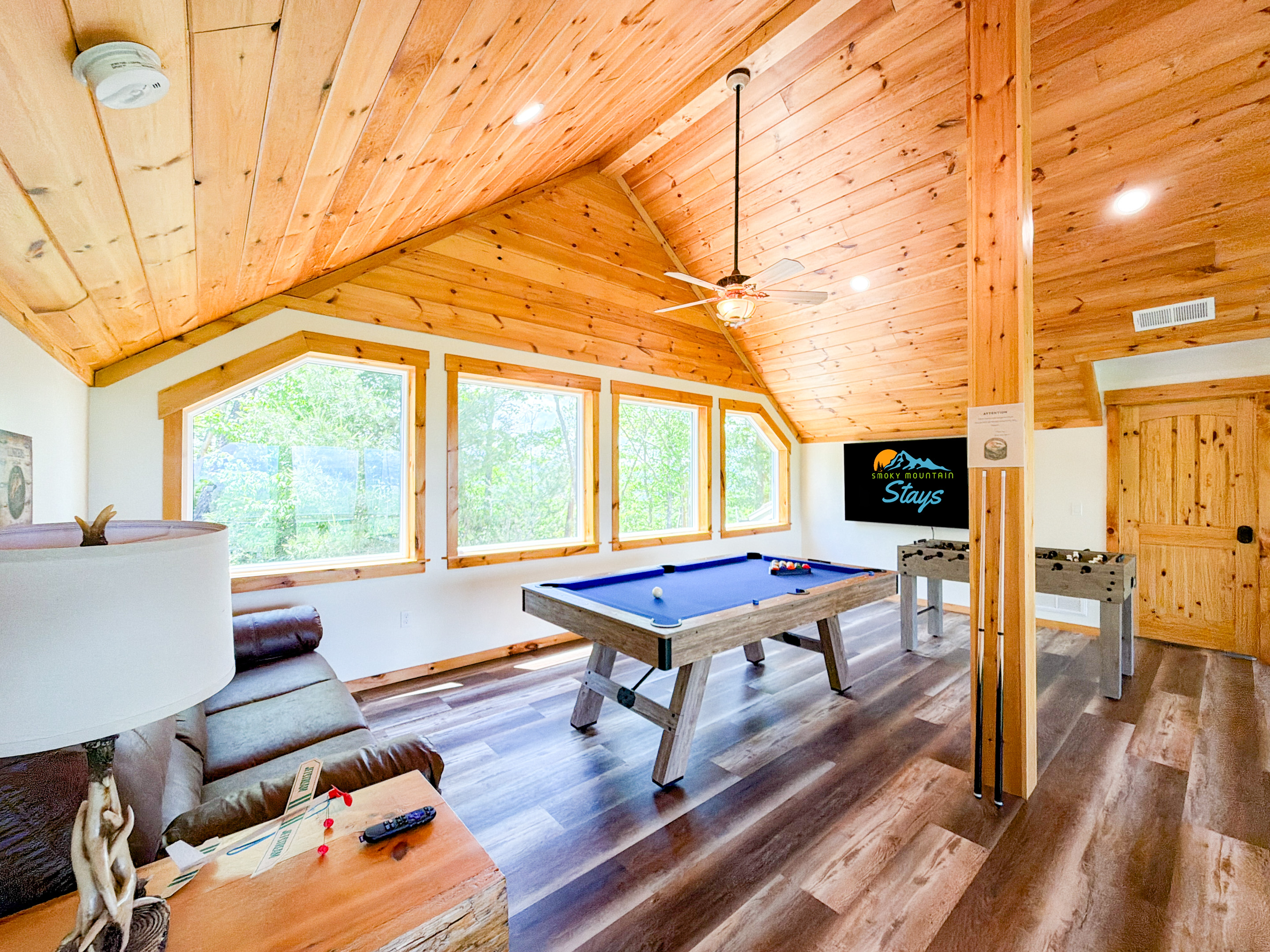The loft features Pool Table, Foosball Table, additional games, and a 75" Roku TV.