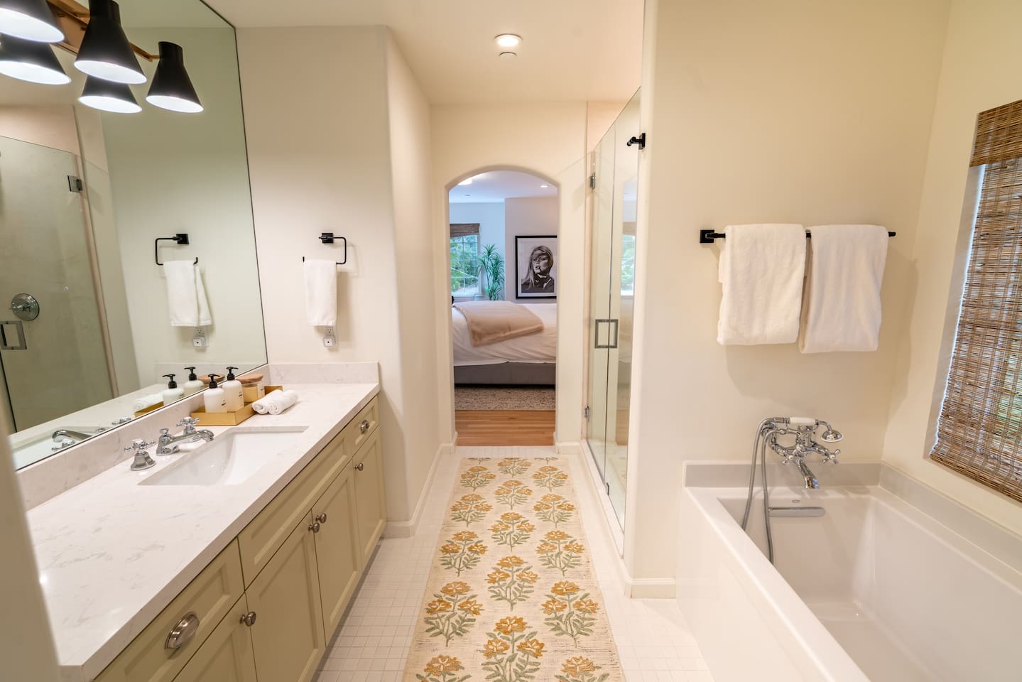 Primary bathroom with shower and bathtub
