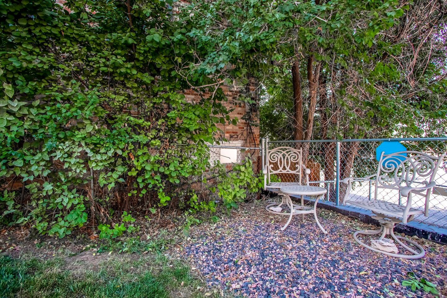 Private Yard with sitting area to enjoy a smoke (helps keep our interior smoke-free),