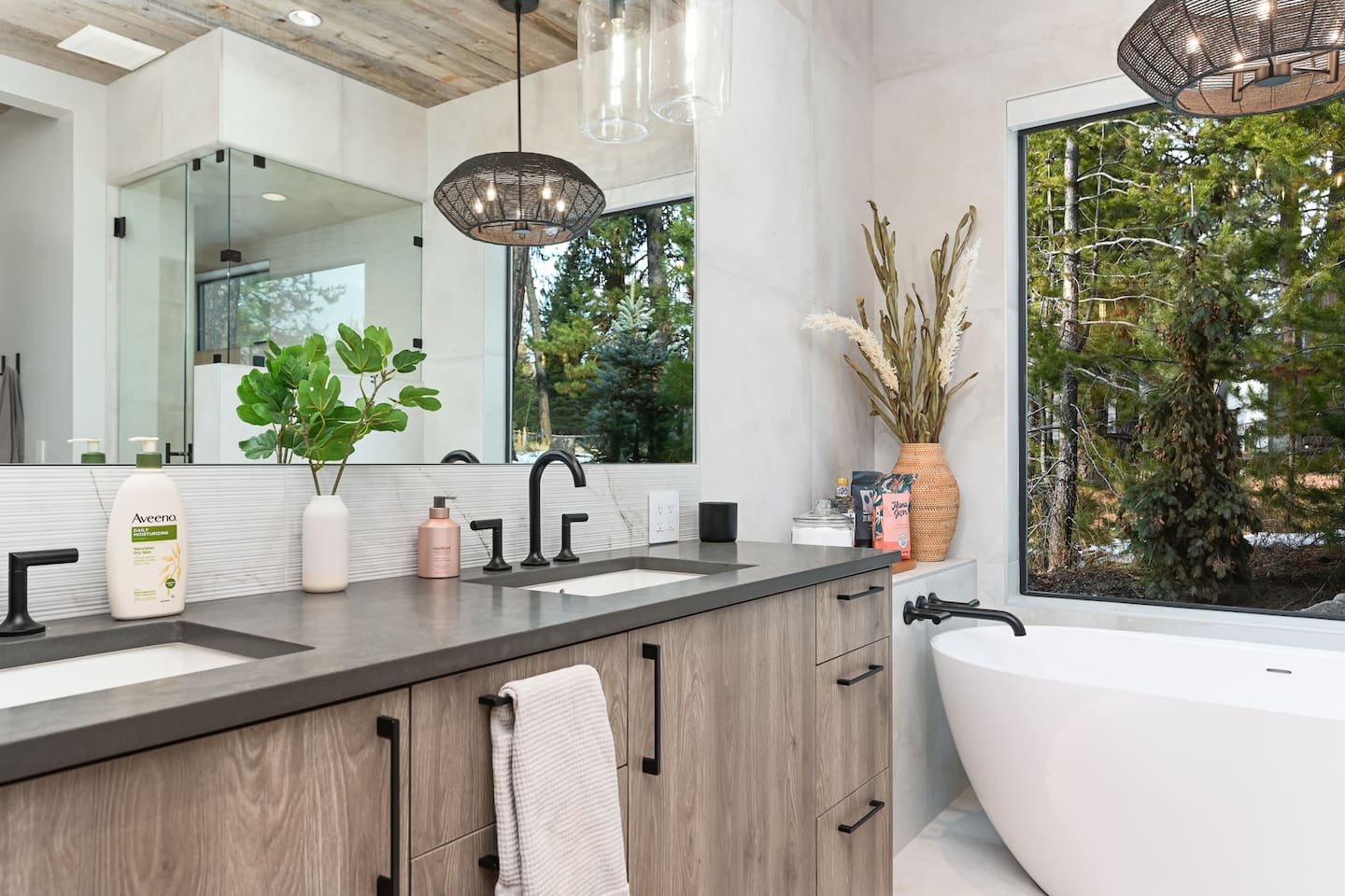 Relax in the bathtub while soaking in serene nature views