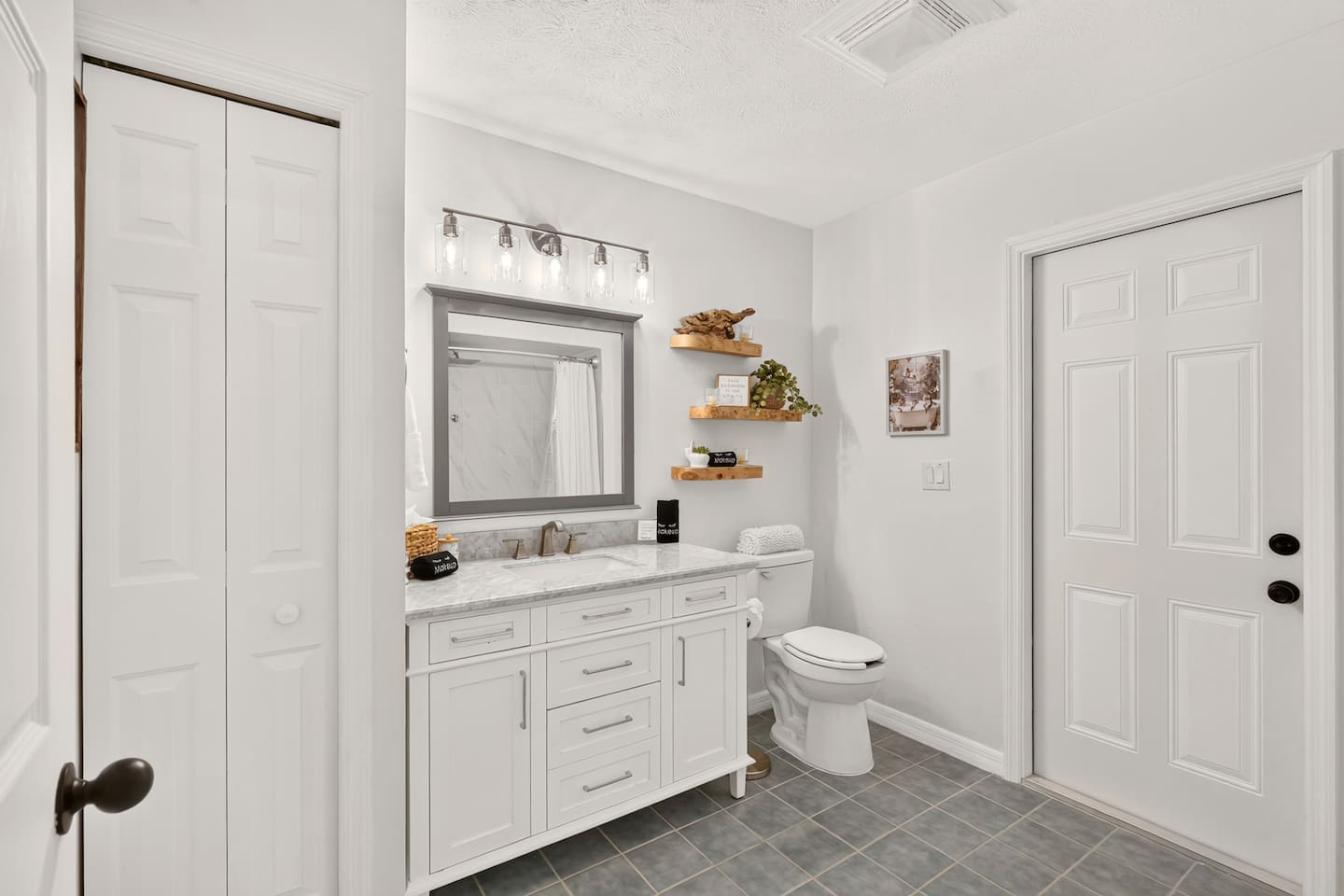 Bathroom #3 is located by bedroom #4.  This bathroom is spacious and features a shower/tub combo and a linen closet.