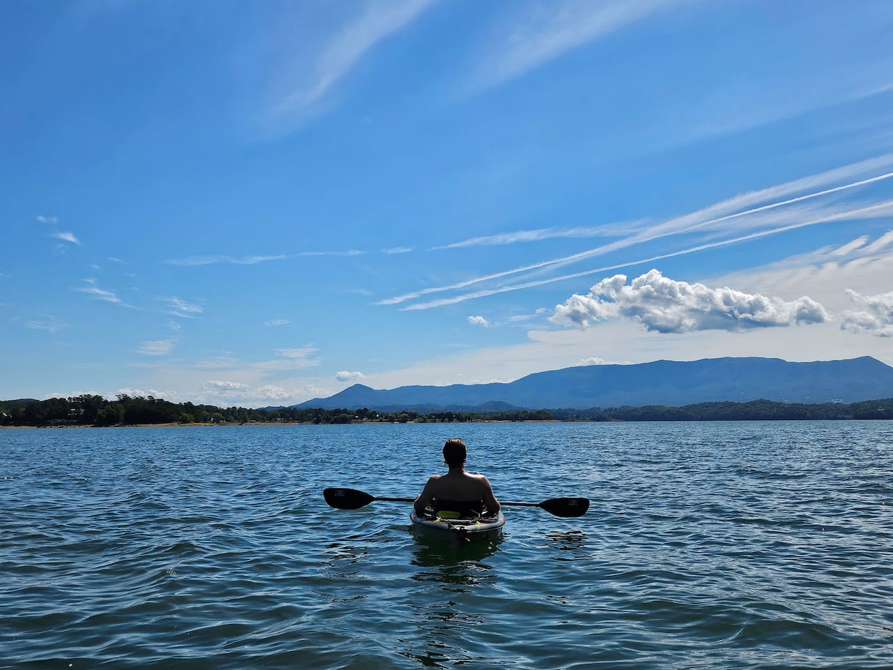 Paddle beyond the cove and the mountain views open up—well worth the trip.