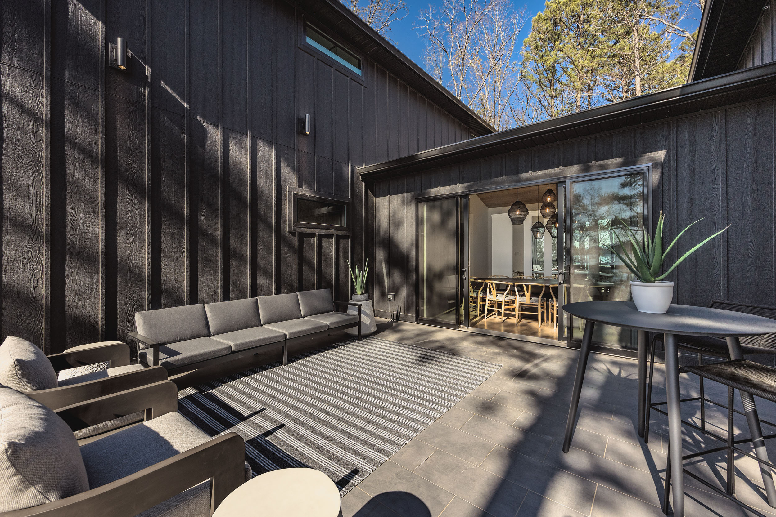 Step outside to this stylish courtyard patio—perfect for morning coffee, evening wine, or casual hangouts between adventures.