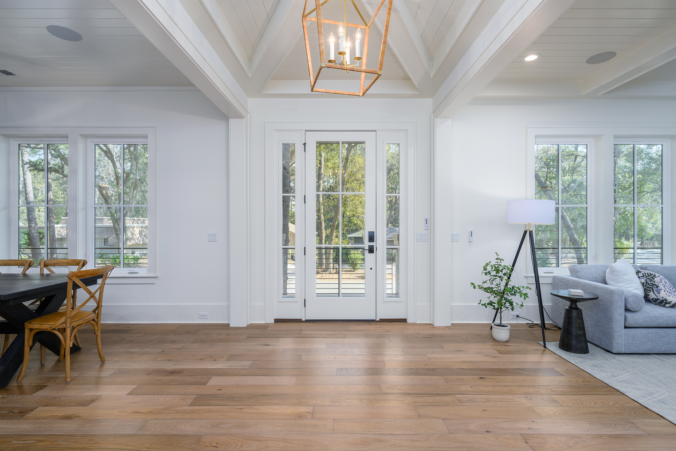 Front door, living room to the right and dining area to the left