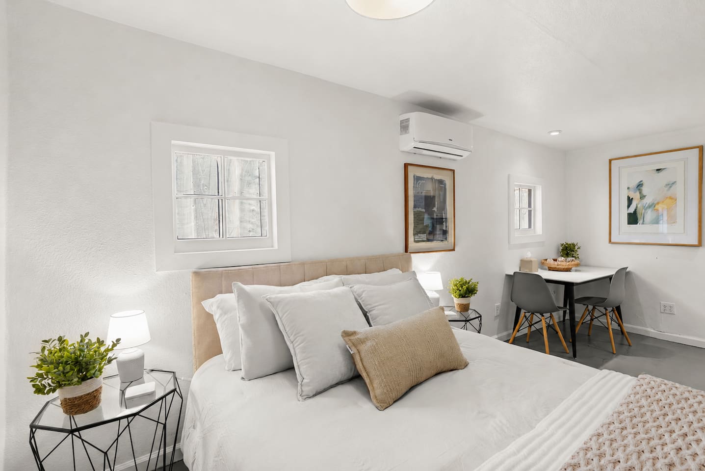 Bedroom 3 features a cozy queen bed, inviting linens, and a calm, comfortable space designed for restful nights.
