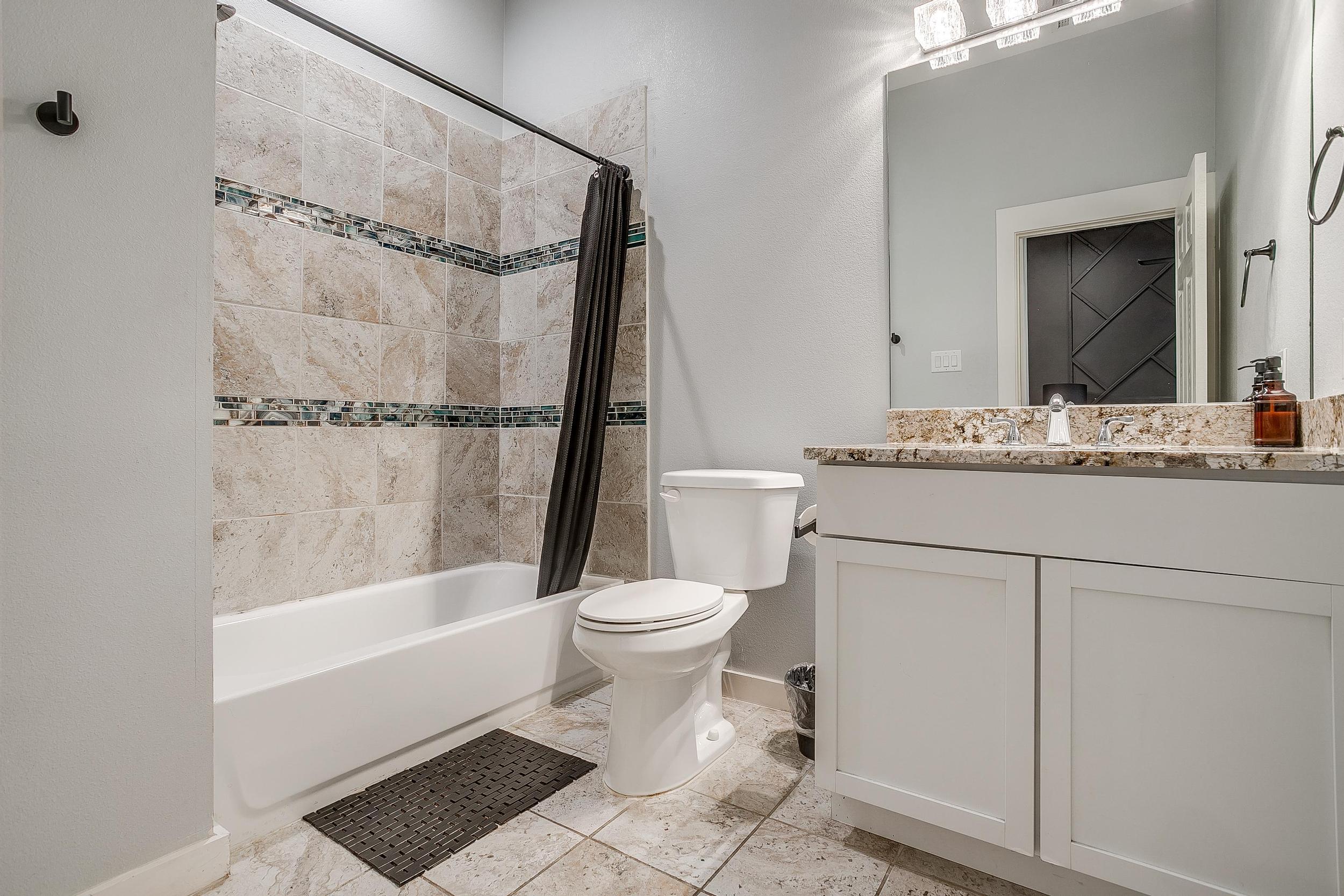 Second full bath with tub/shower combo—ideal for families.