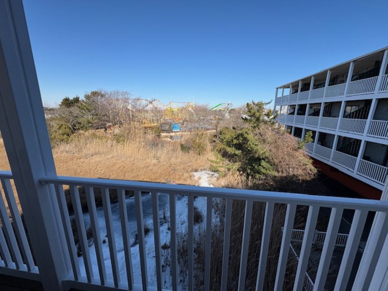 View of water and amusement park, in quiet neighborhood