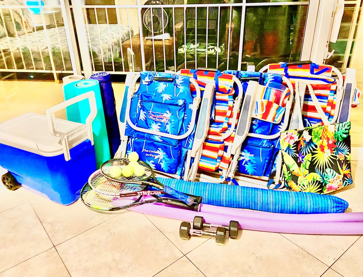 We provide beach chairs, beach umbrella, cooler, beach bag, tennis rackets, tennis balls, 5 pound hand weights, and yoga mats.