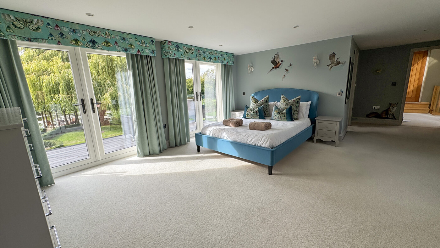 Teal bedroom and balcony