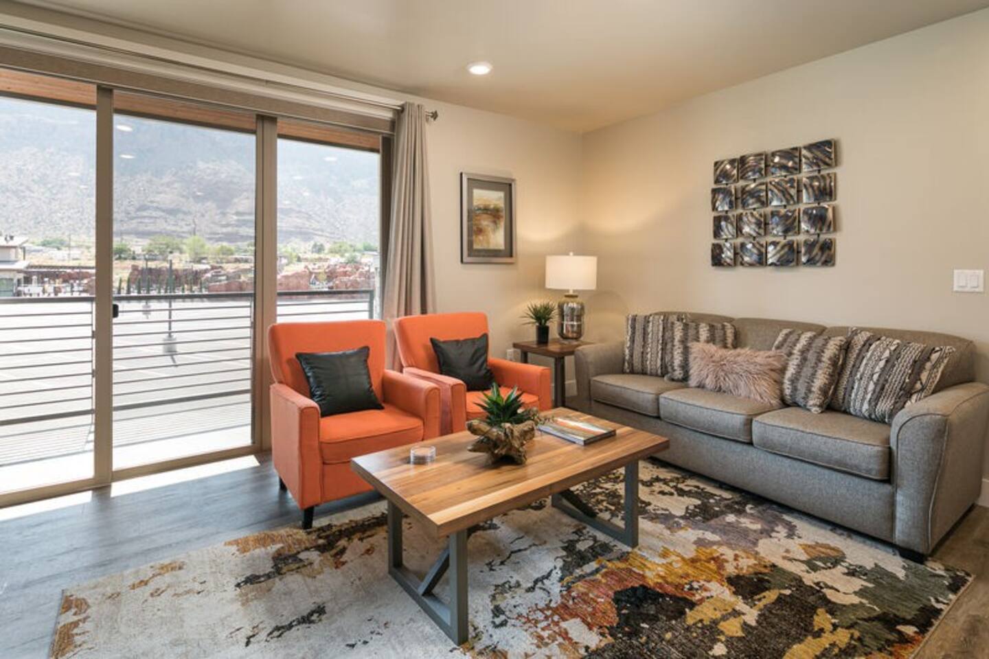 Warm and inviting living area and decor awaits you at this Sage Creek Condo.