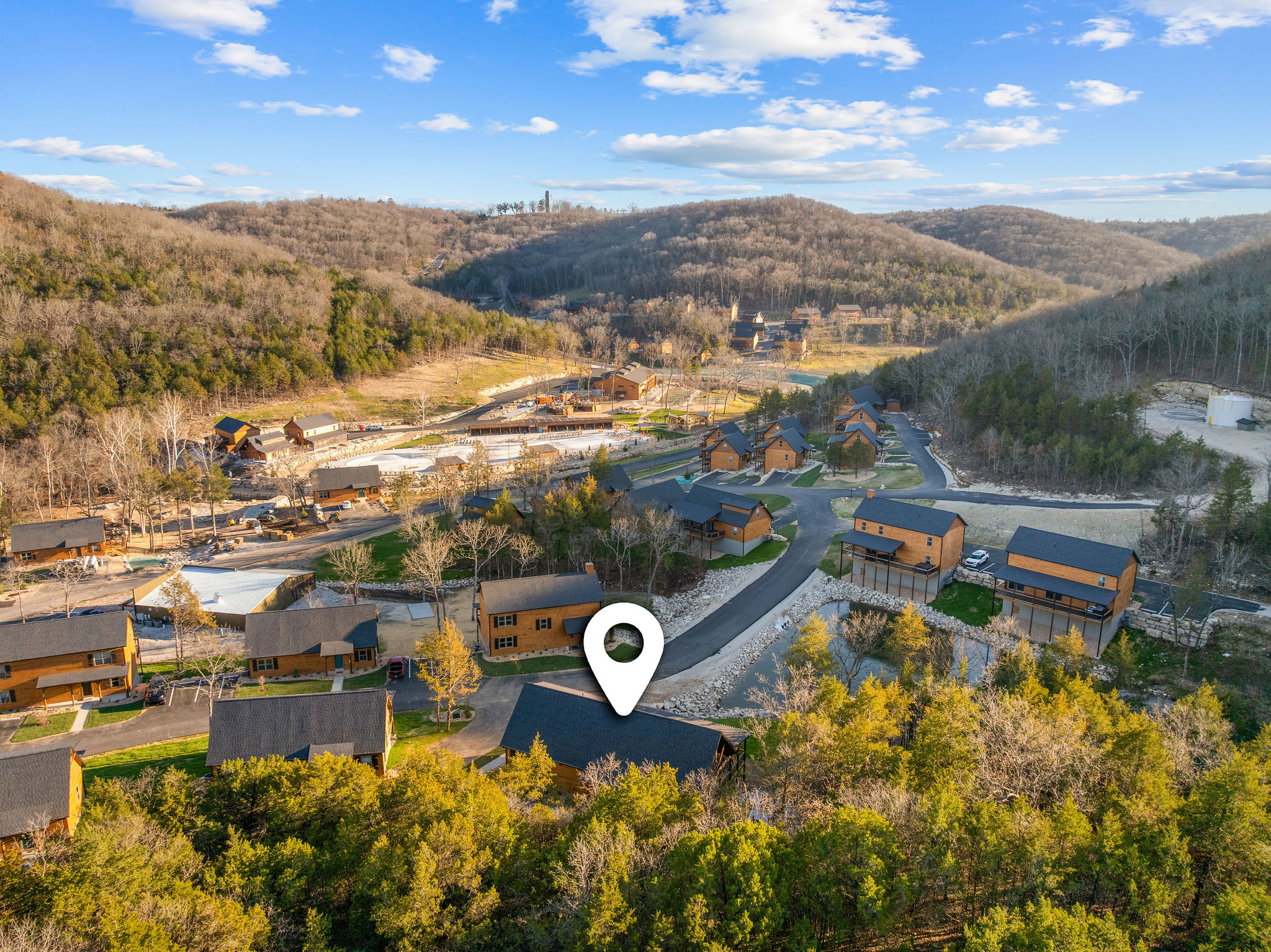An elevated look at the surrounding cabins and natural landscape.
