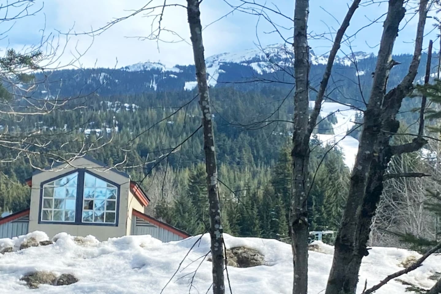 Views of Blackcomb Mountain from the 2nd and 3rd-floor bedroom windows.
