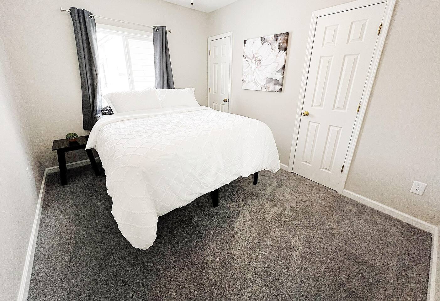 Bedroom with Queen Bed and Double Closets