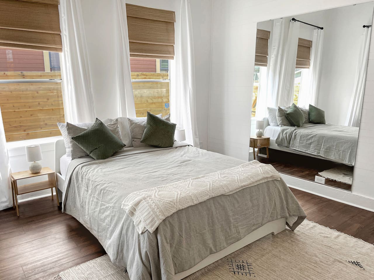 Enjoy our front bedroom and admire how good you look in our super-sized mirror!