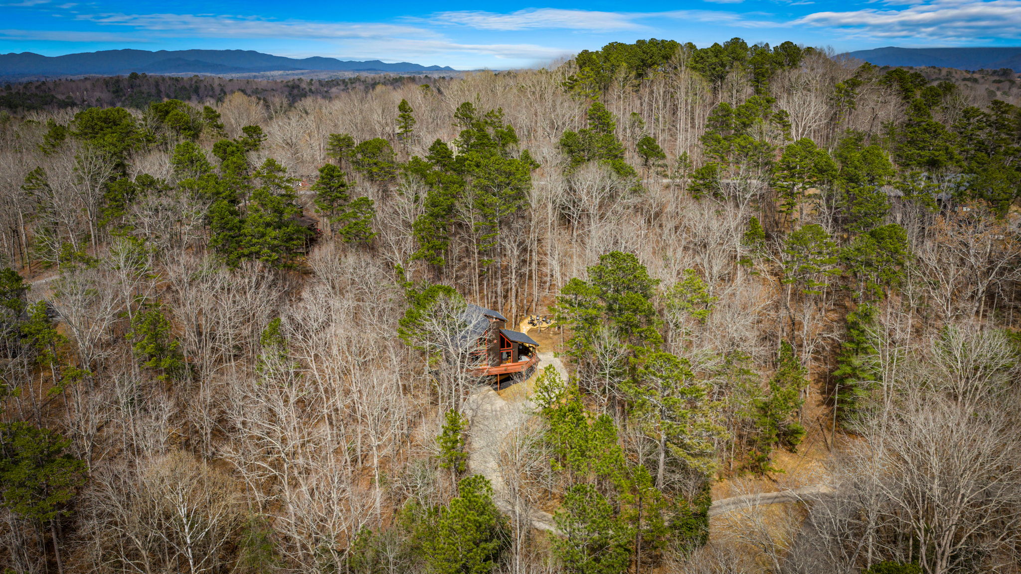 The sweeping mountain views create a serene and picturesque backdrop.