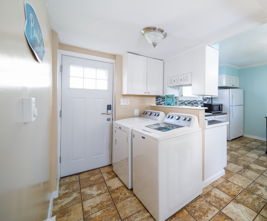 Get all of your clothes cleaned up in this second laundry area.