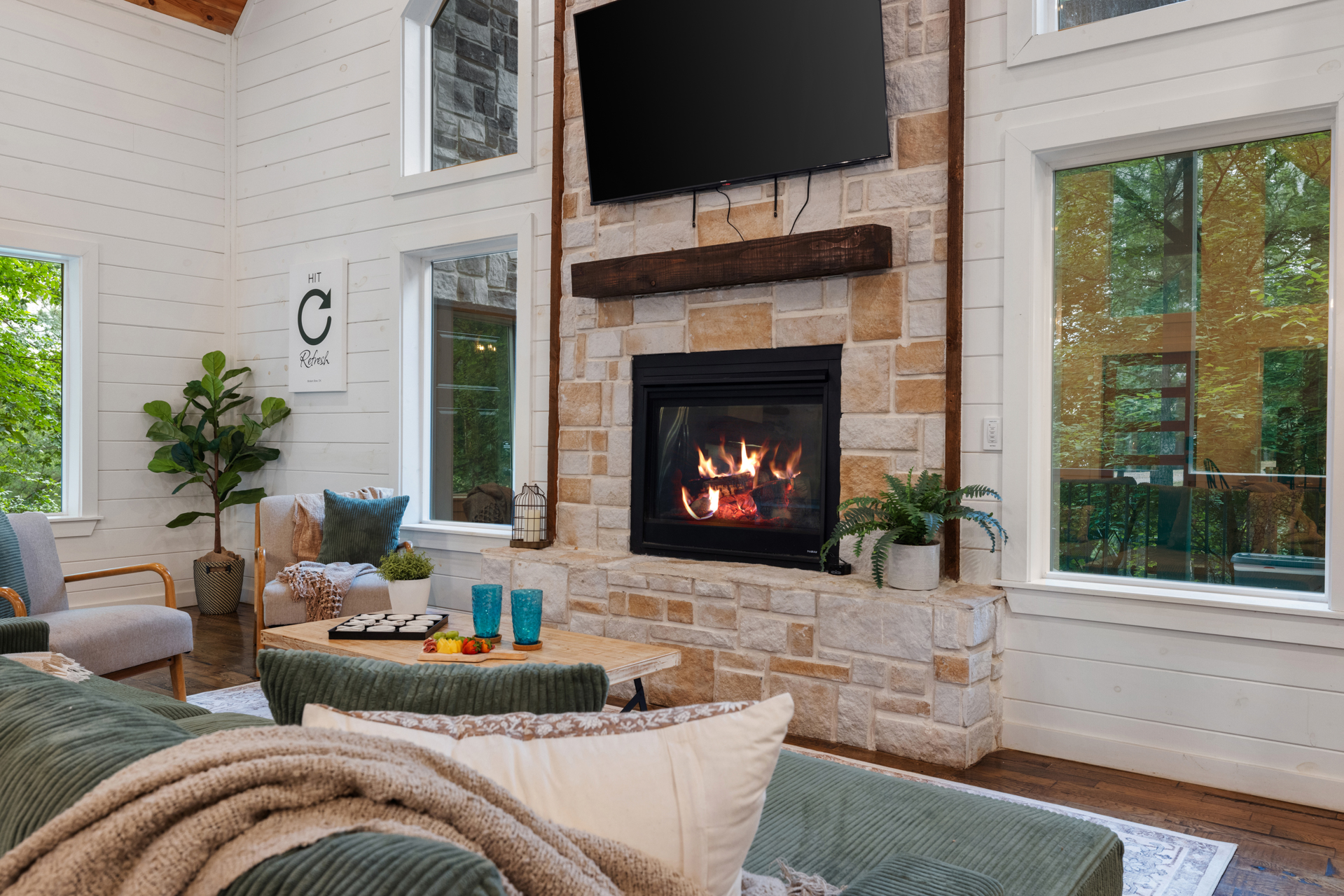Living room fireplace moments that make slowing down feel effortless.
Curl up by the fire, sink into the cozy seating, and enjoy the kind of peaceful cabin atmosphere that instantly feels like home.