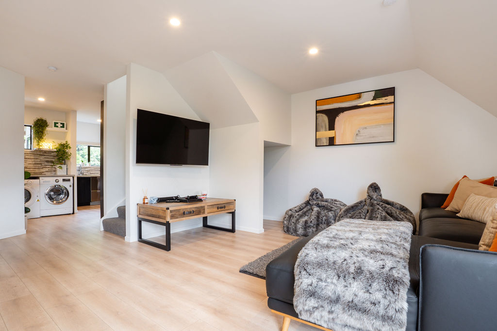 After days around Queenstown or Lake Wakatipu, this upstairs lounge detail captures the easy comfort waiting back in Fernhill.