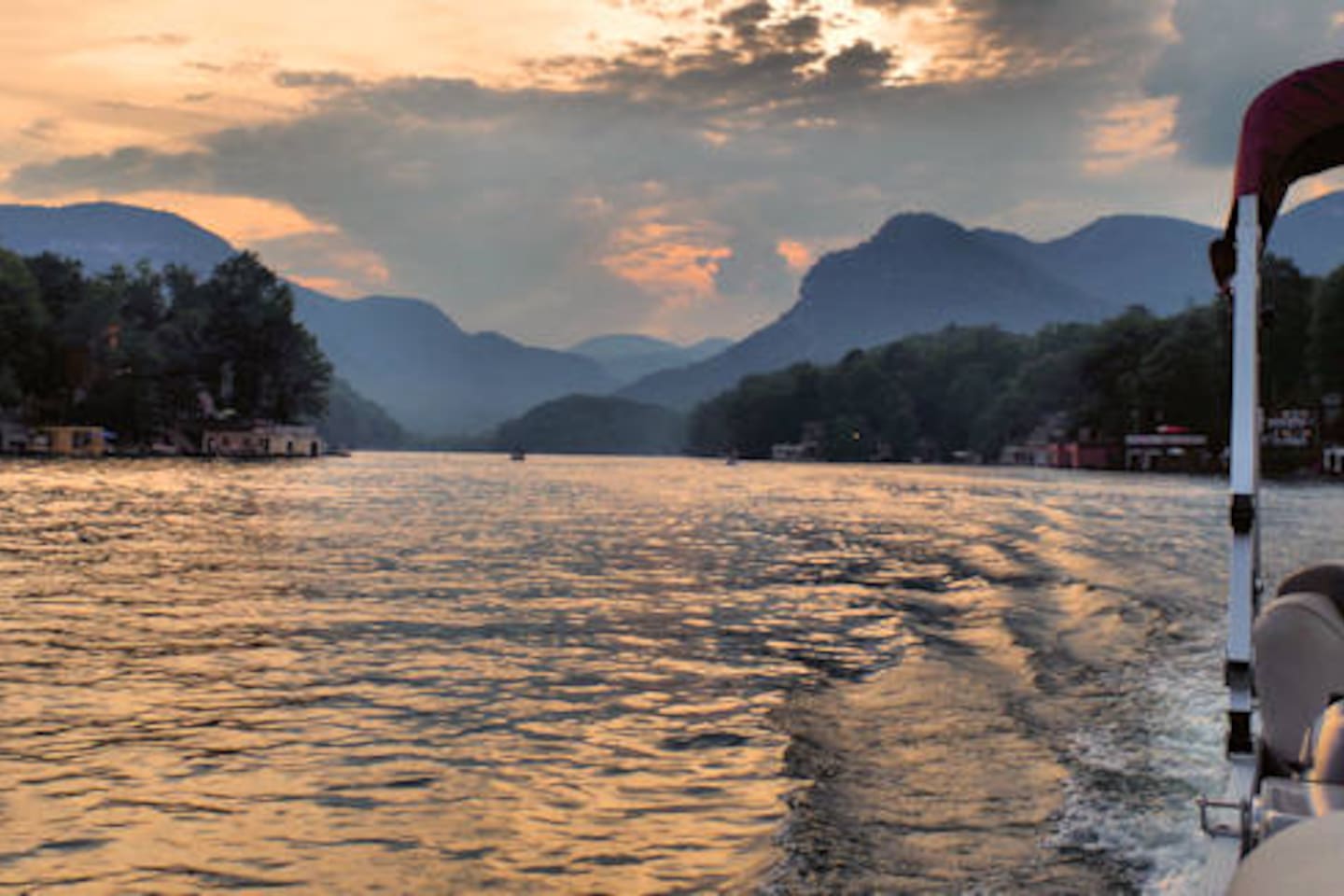 Pontoon boats available for rental on Lake Lure! There is not a more peaceful,  beautiful  lake.