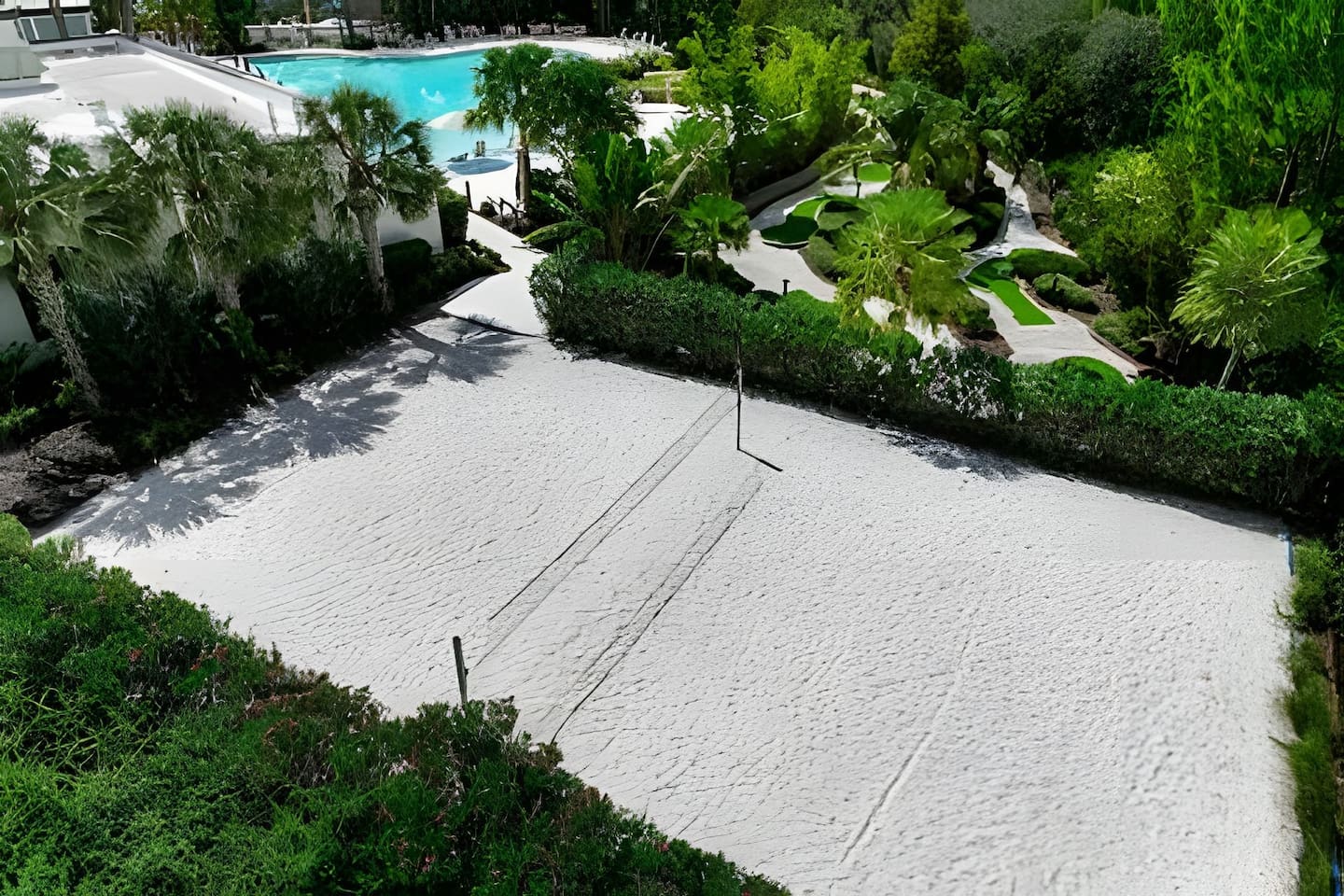 Game on! Enjoy an exciting match on the sand volleyball court.