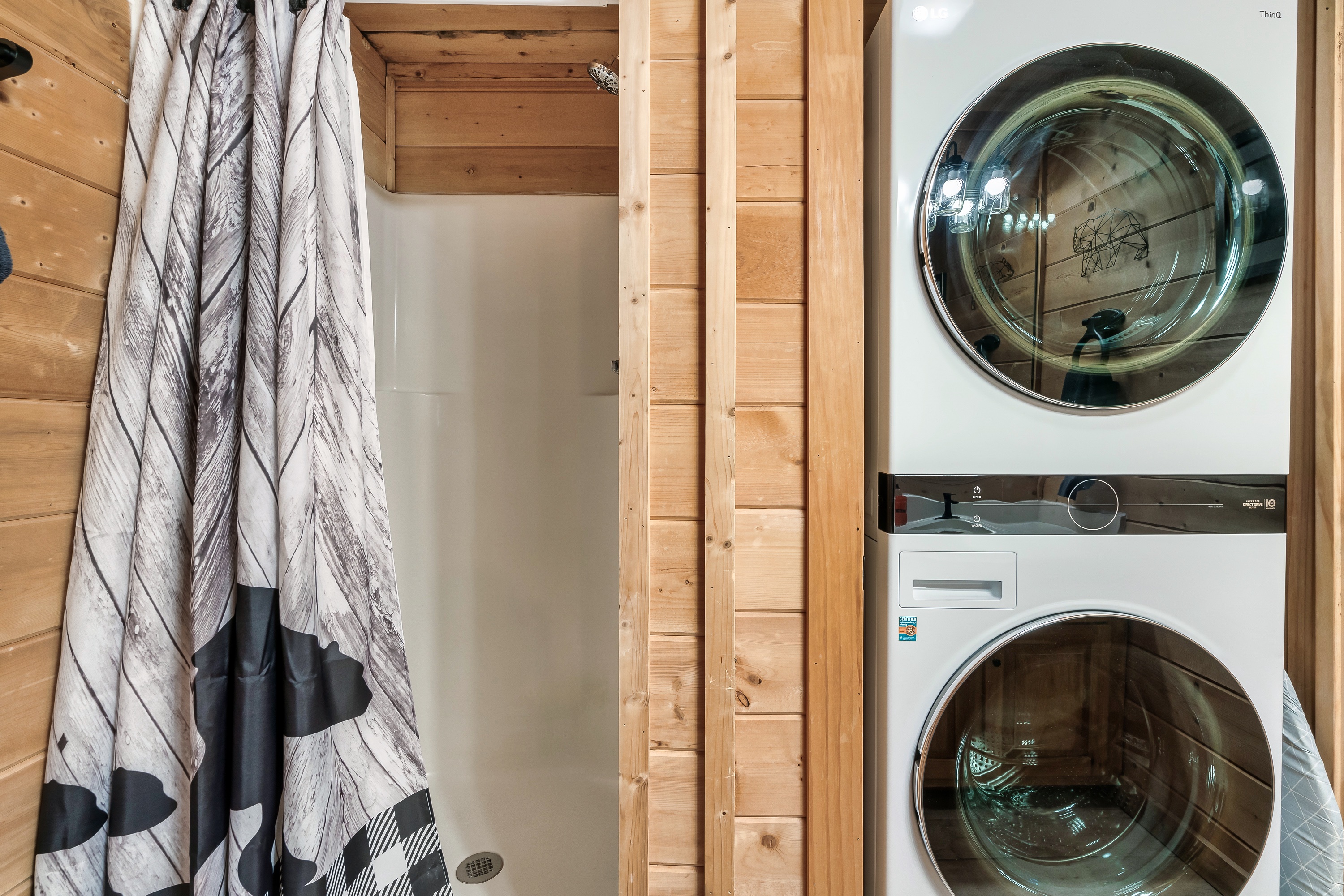 Washer and Dryer located in lower level bathroom.