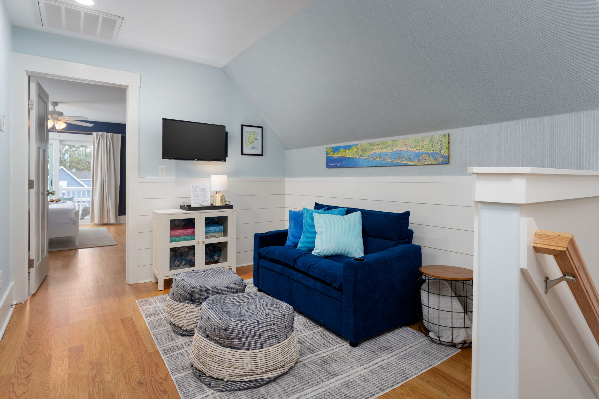 Cozy upstairs lounge area — a perfect spot for relaxing, reading, or kids’ hangouts.