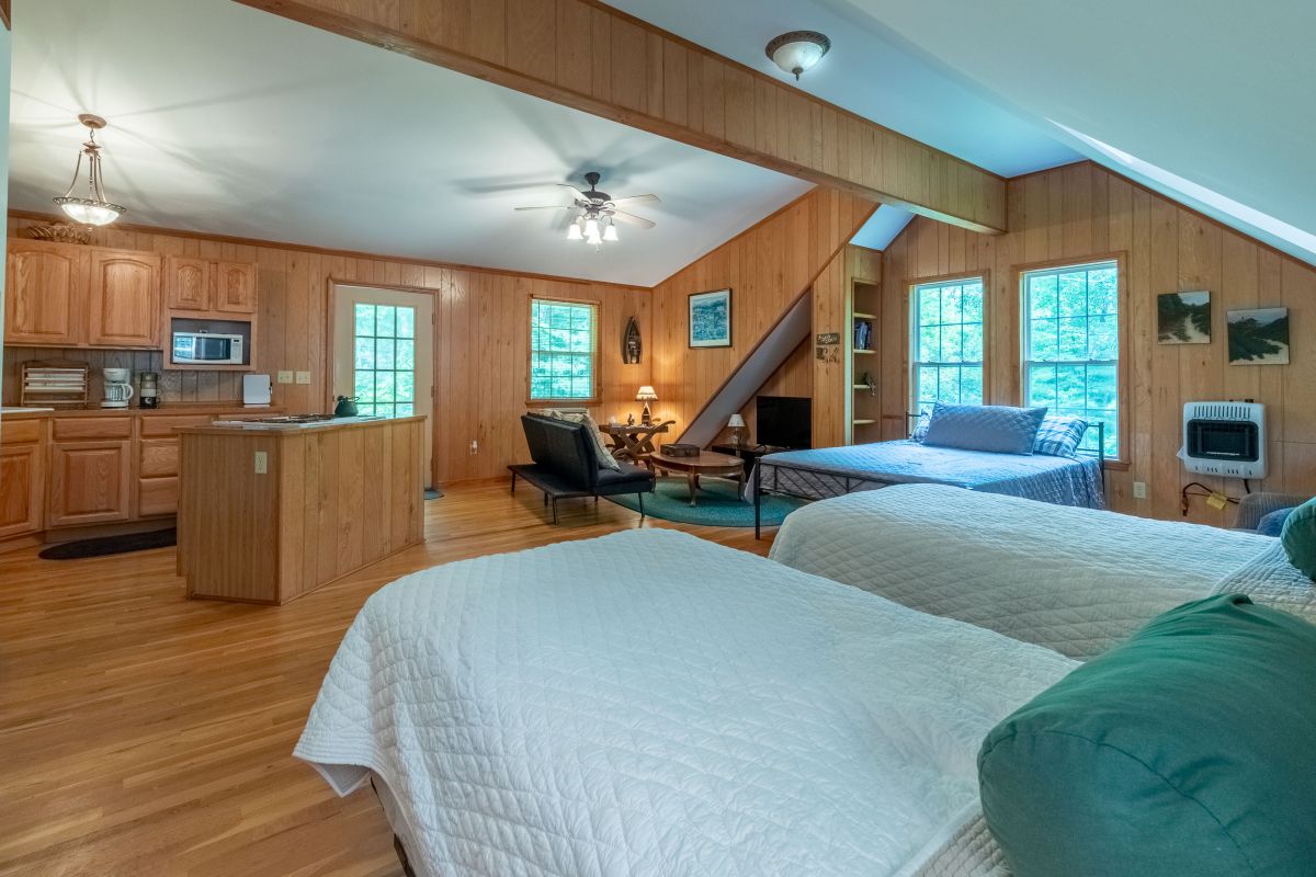 Spacious Retreat: Relax in this inviting space with bright windows and rustic charm!