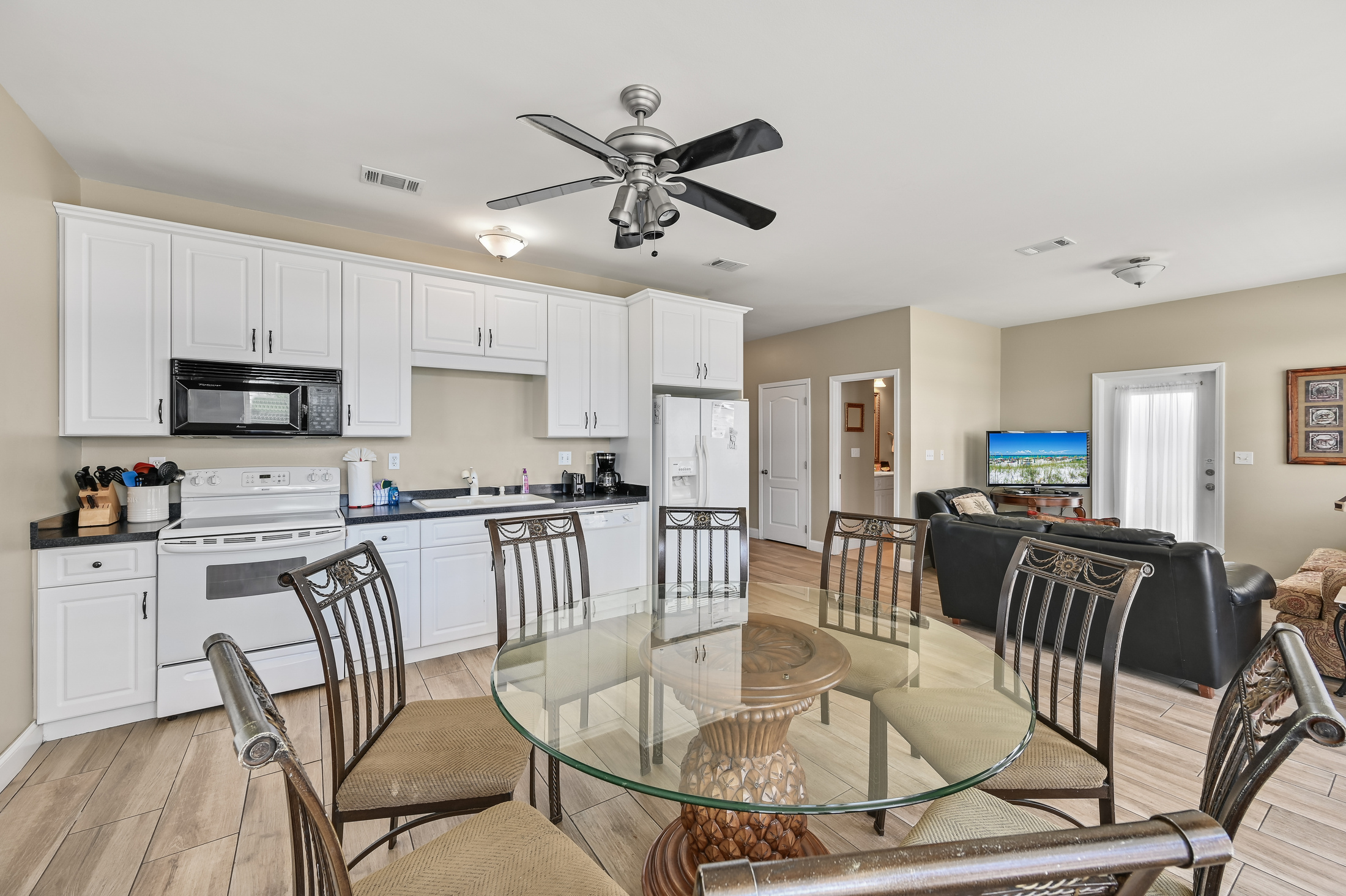 Dining Area #1 (First Floor)– Coastal round table seating 6