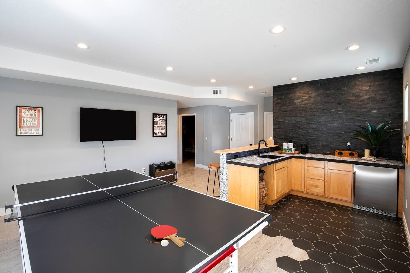 The walkout basement is the perfect hangout space, featuring a ping pong table and a bar for entertaining. Whether you're having game night or relaxing after a day in the mountains, this fun lower-level retreat has something for everyone!