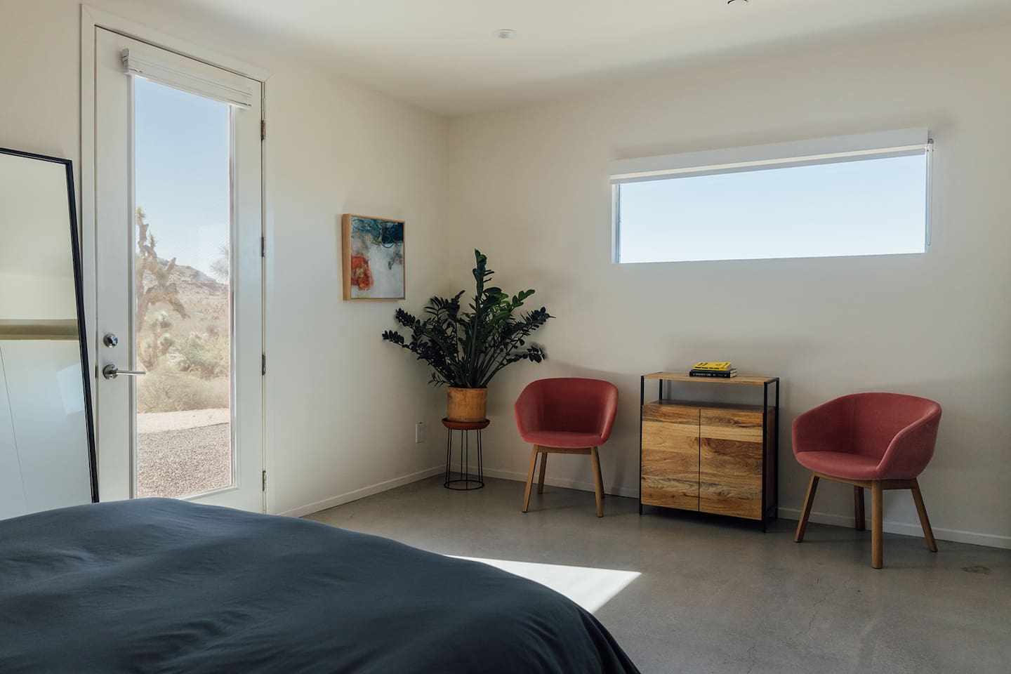 Full length mirror and comfortable seating area.