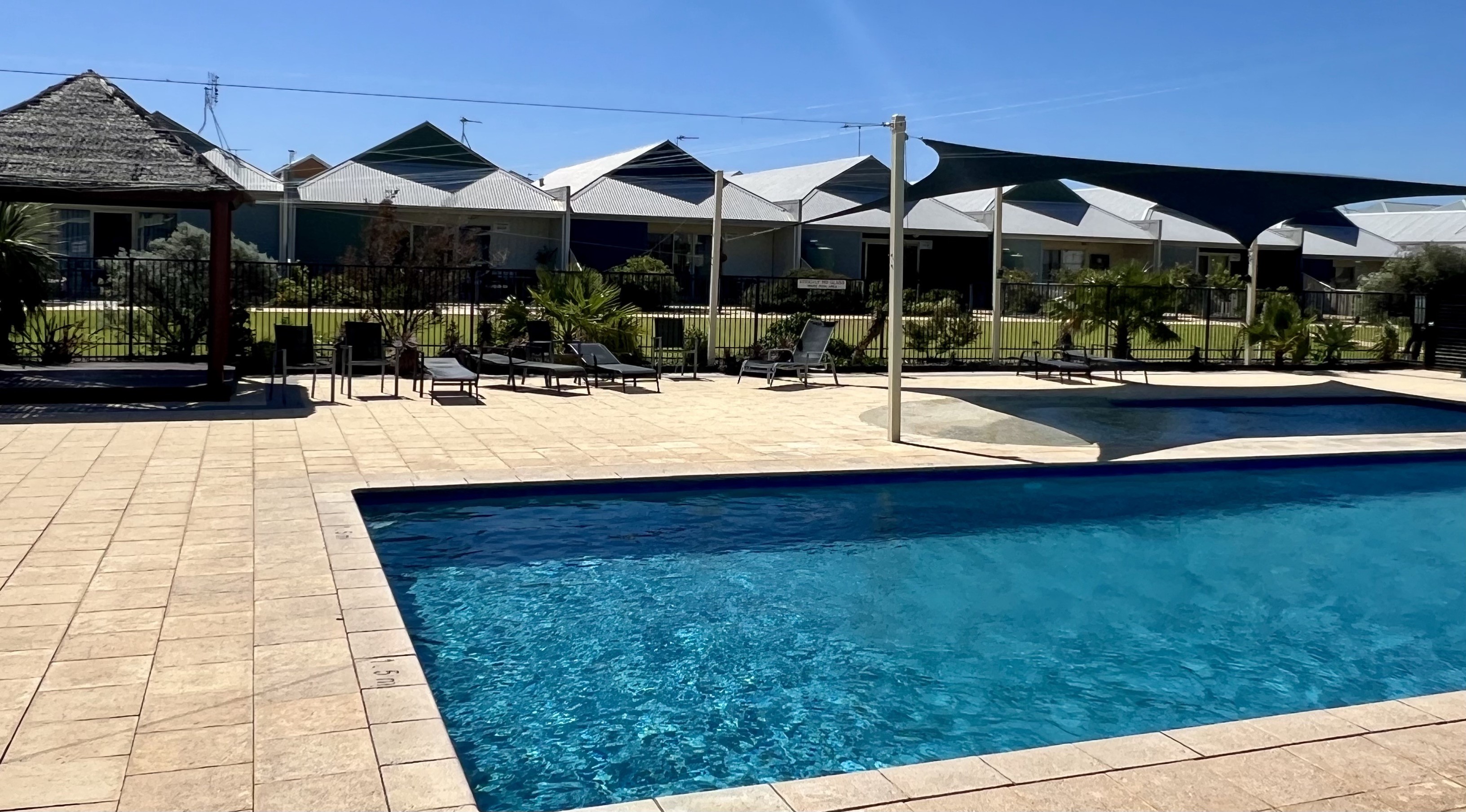 Lovely welcoming swimming pool, shade sails and sunlounges galore!