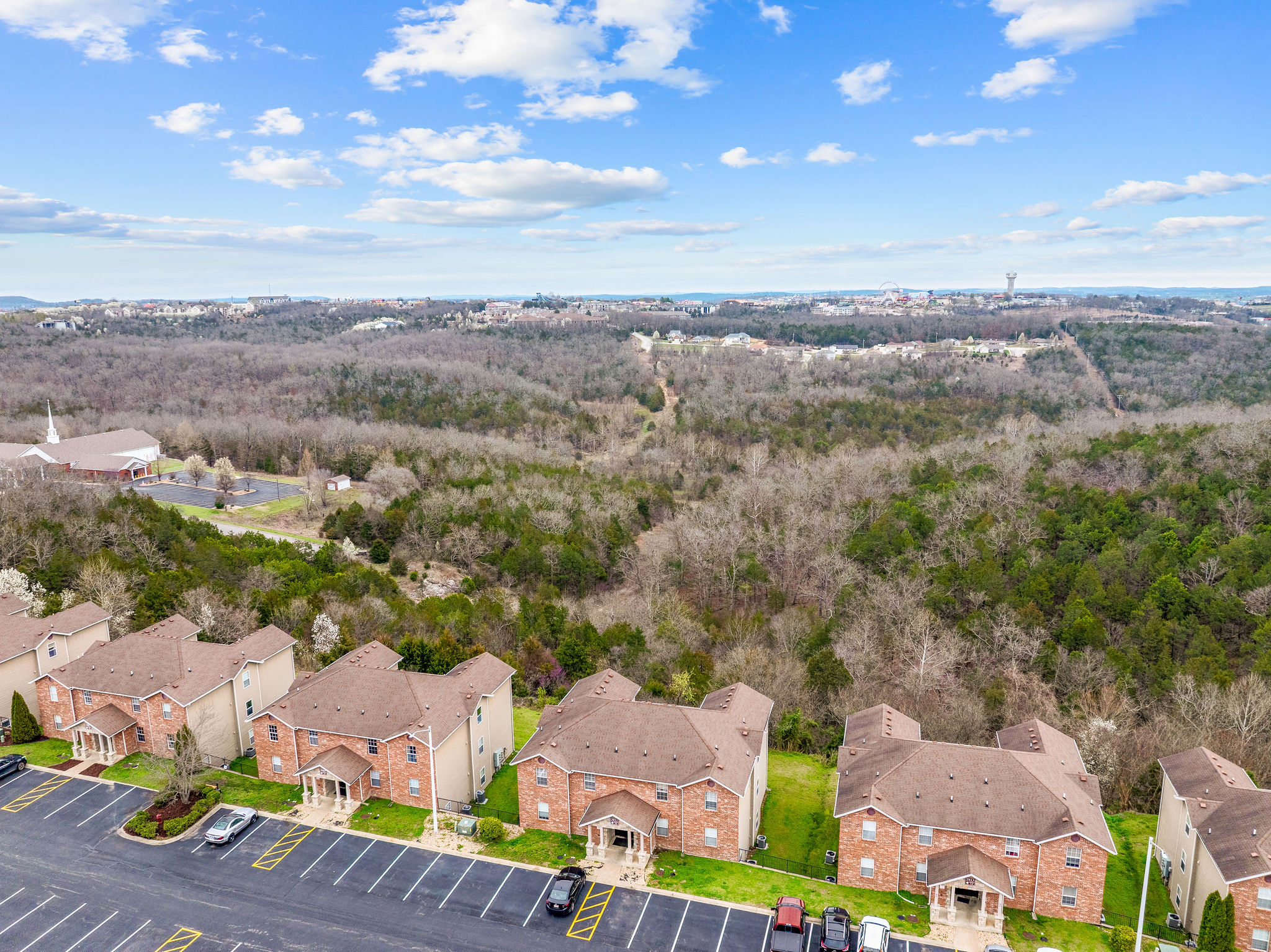 Aerial view of the buildings and surrounding forest
