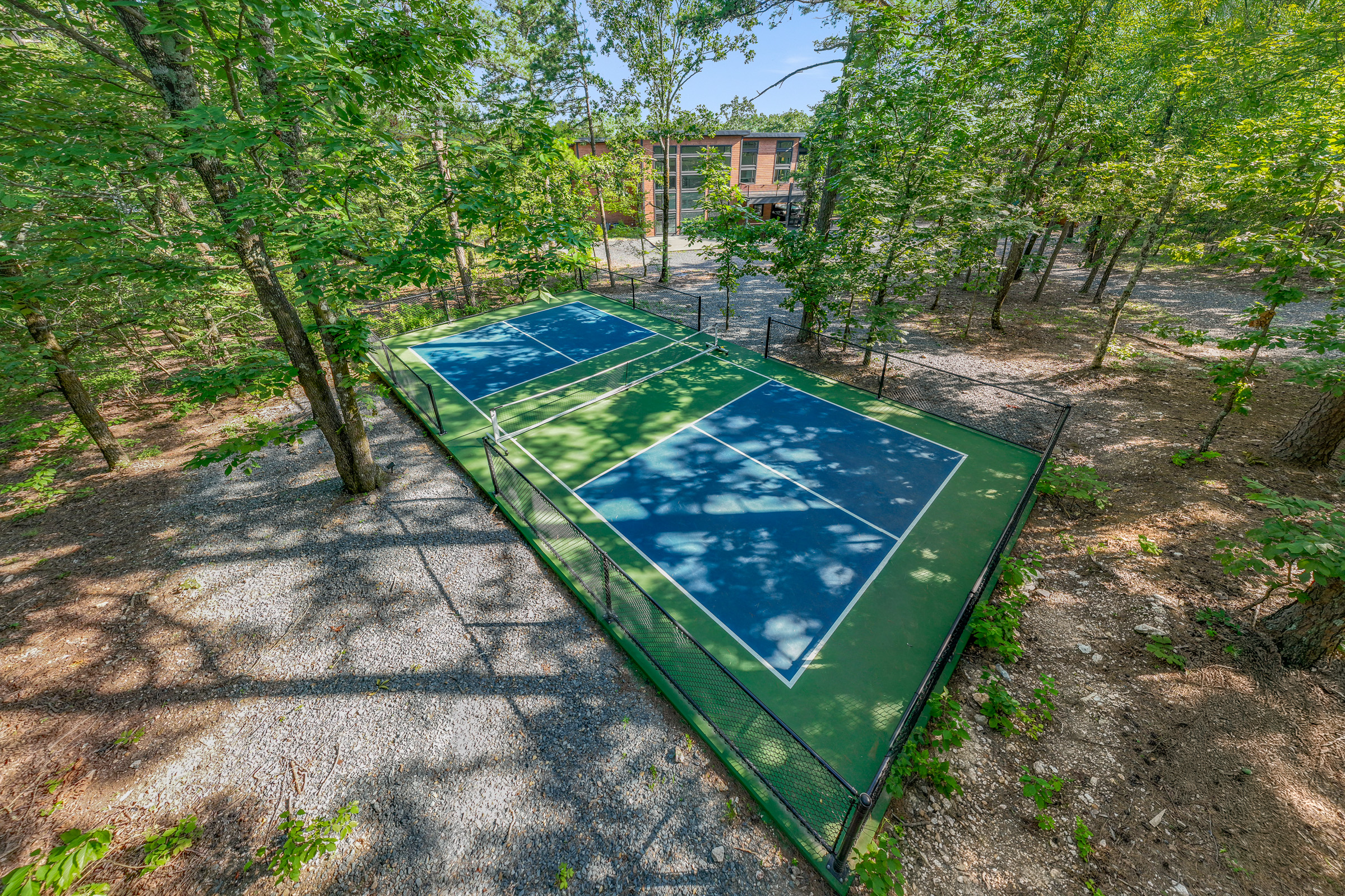 Championship Pickleball Court - surrounded by towering pines