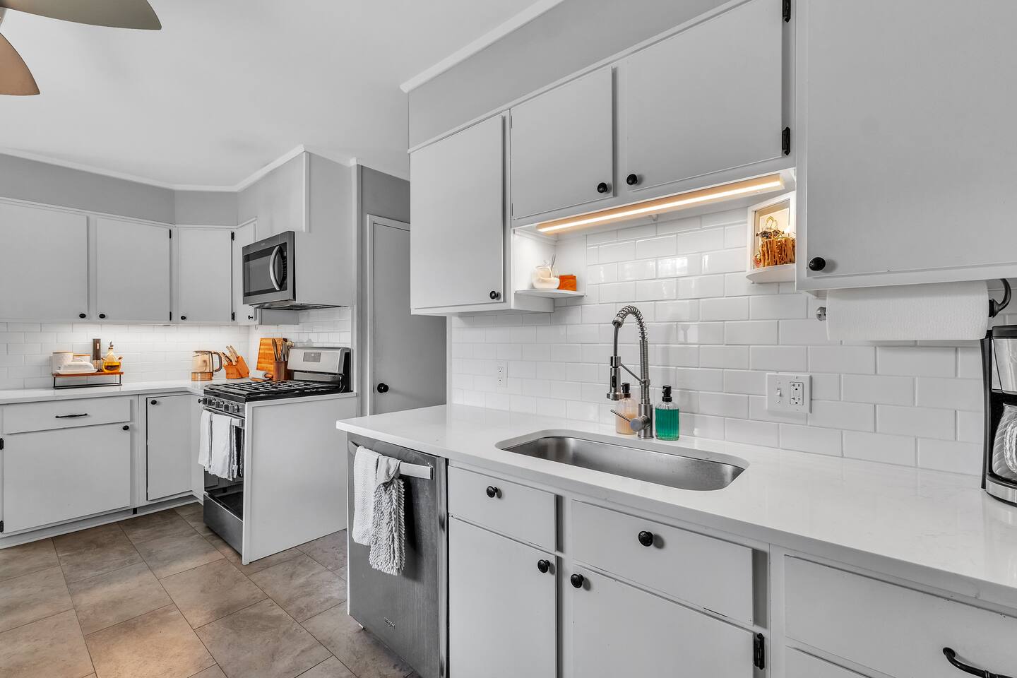 Modern cooking appliance and spacious countertops, this kitchen has it all!