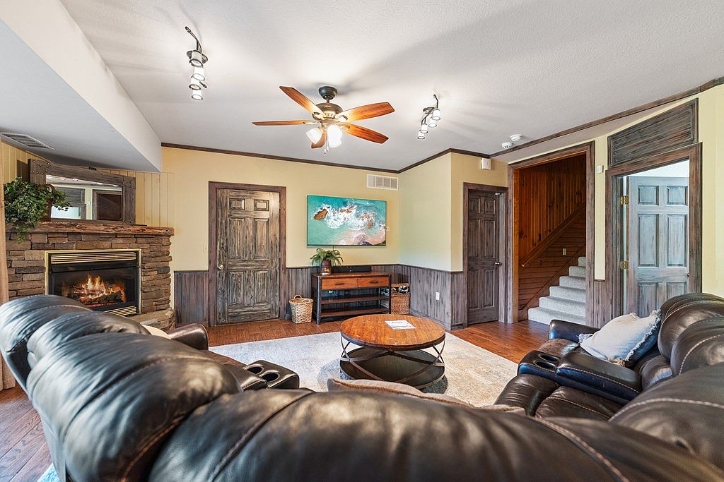 Second living area in lower level - perfect for movie nights or the big game
