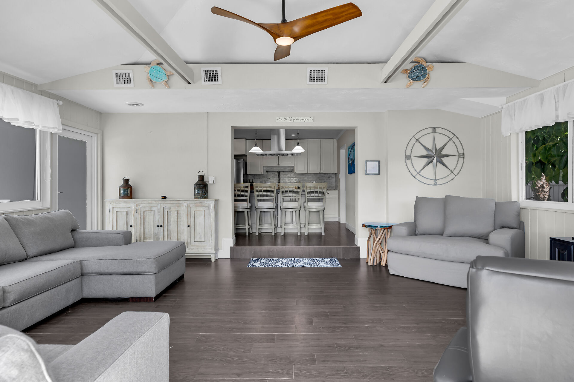 Large open living room with sleeper sofa