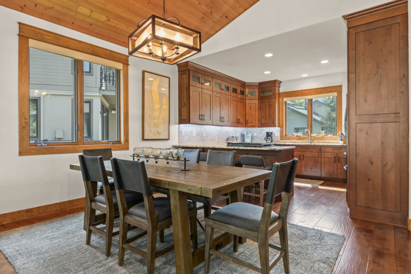 Dining Area & Kitchen in Background
