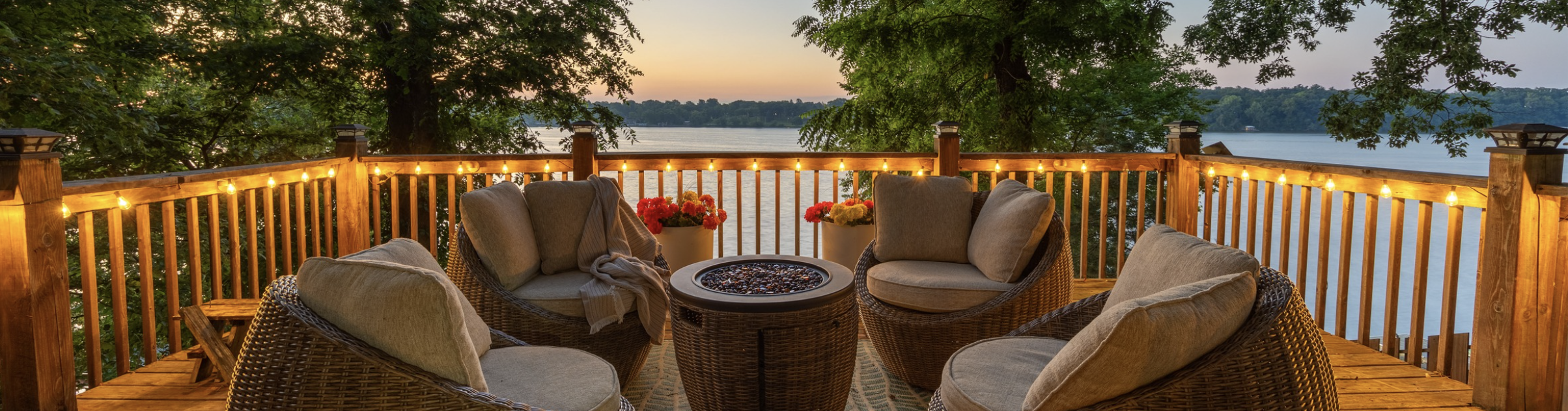 Enjoy a fire and the elevated lake views from the top tier deck at The Ridge